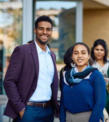 Ashraf and Shiemaa standing outside at the Skoll Community Convening in 2022.