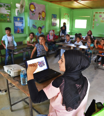 Thaki woman teacher in a classroom